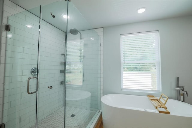 425 Lakewood Dr, Townville, SC 29689 - full bathroom with a shower stall, a freestanding bath, and recessed lighting