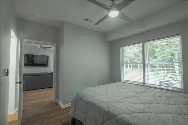 425 Lakewood Dr, Townville, SC 29689 - bedroom with wood finished floors, baseboards, and a ceiling fan