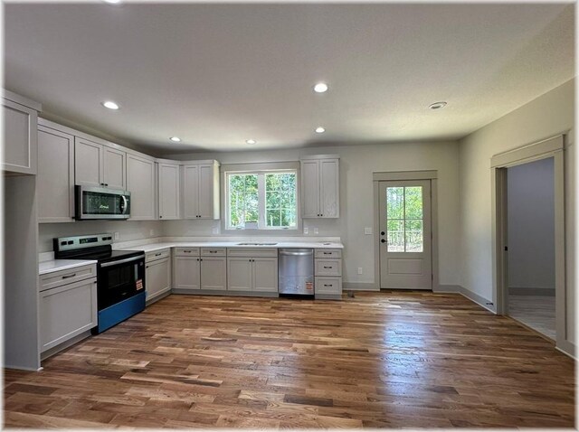 190 Jefferson Pl, Walhalla, SC 29691 - kitchen with appliances with stainless steel finishes, dark wood finished floors, light countertops, and recessed lighting