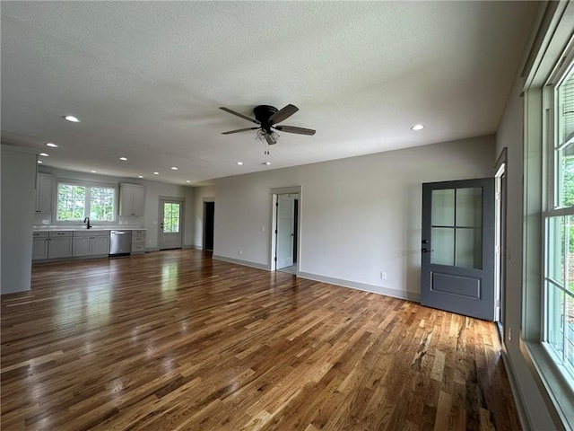 190 Jefferson Pl, Walhalla, SC 29691 - unfurnished living room with dark wood-style flooring, a ceiling fan, recessed lighting, and a textured ceiling