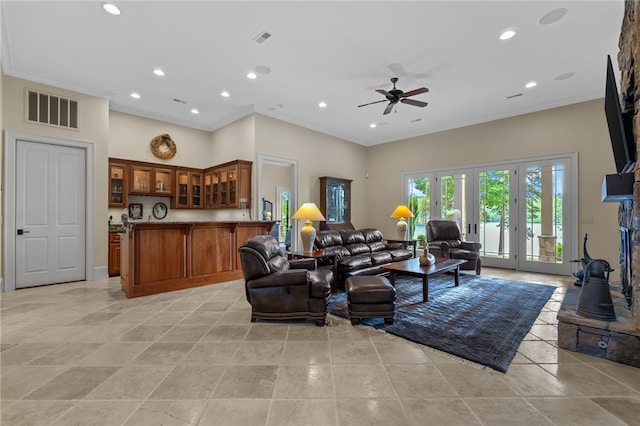 117 Misty Water Loop, Sunset, SC 29685 - living room featuring ornamental molding, ceiling fan, recessed lighting, a high ceiling, and french doors