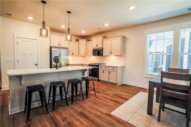 117 Founders Blvd, Central, SC 29630 - kitchen with range, stainless steel refrigerator with ice dispenser, dark wood finished floors, baseboards, and recessed lighting