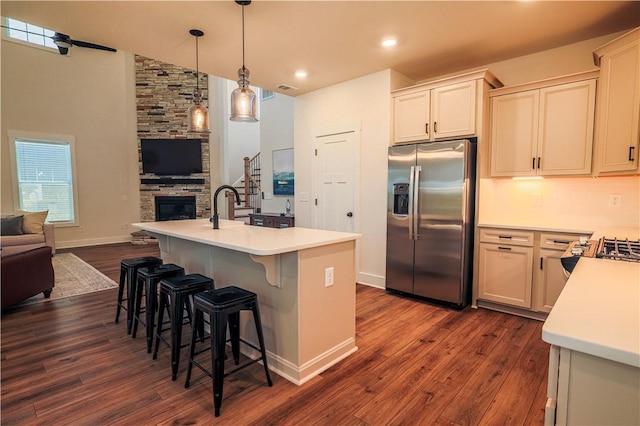 117 Founders Blvd, Central, SC 29630 - kitchen with stainless steel fridge with ice dispenser, open floor plan, light countertops, dark wood-style flooring, and lofted ceiling