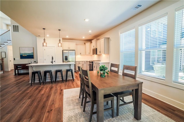 117 Founders Blvd, Central, SC 29630 - dining area featuring dark wood finished floors, baseboards, stairway, and recessed lighting