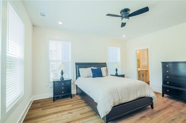 117 Founders Blvd, Central, SC 29630 - bedroom with light wood-style floors, multiple windows, baseboards, ensuite bath, and recessed lighting