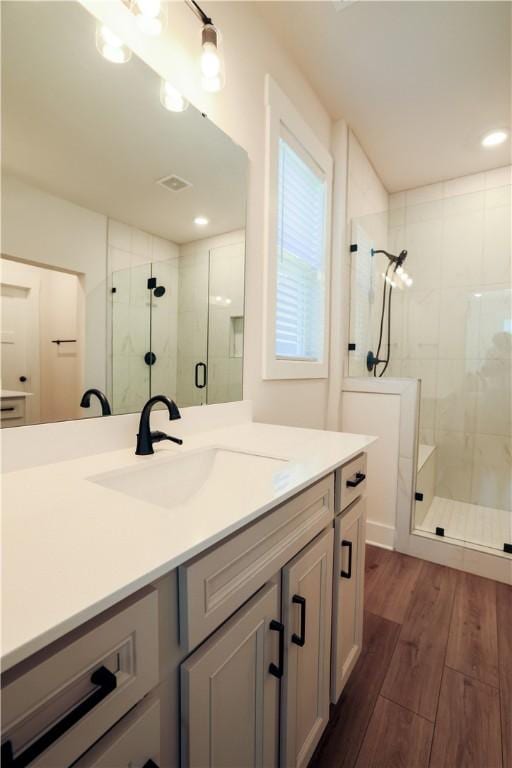 117 Founders Blvd, Central, SC 29630 - full bathroom with a stall shower, vanity, wood finished floors, and recessed lighting