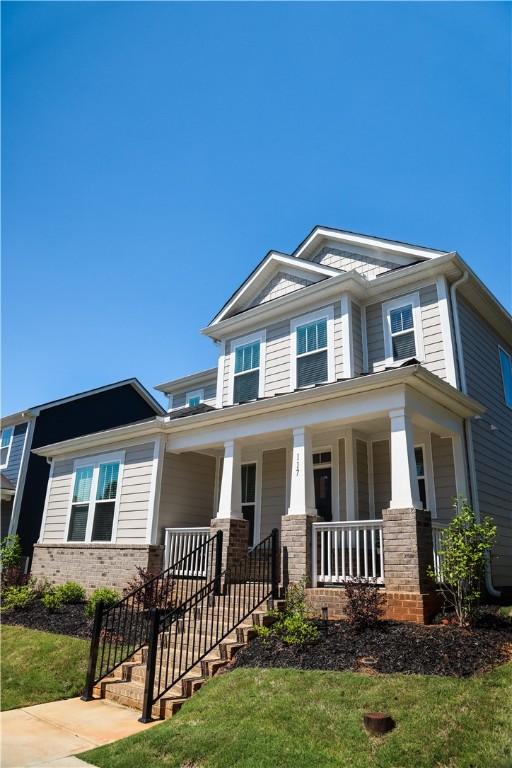 117 Founders Blvd, Central, SC 29630 - craftsman-style house with a porch and brick siding