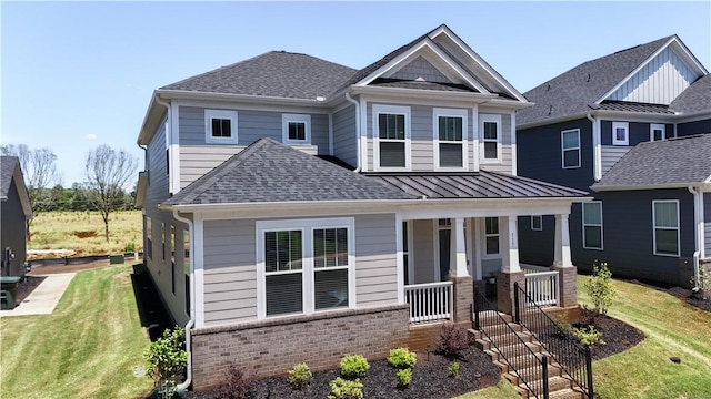 117 Founders Blvd, Central, SC 29630 - craftsman-style home featuring a porch, brick siding, a shingled roof, and a front yard