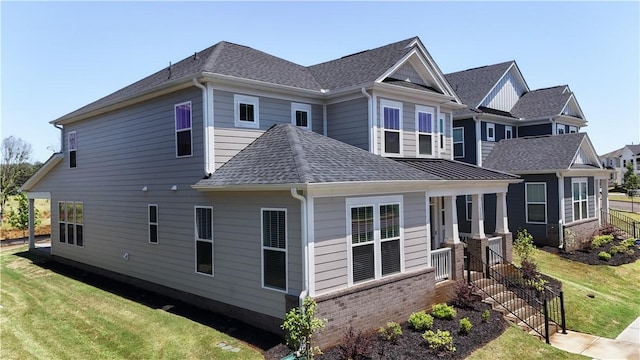 117 Founders Blvd, Central, SC 29630 - view of property exterior featuring roof with shingles, a yard, and brick siding