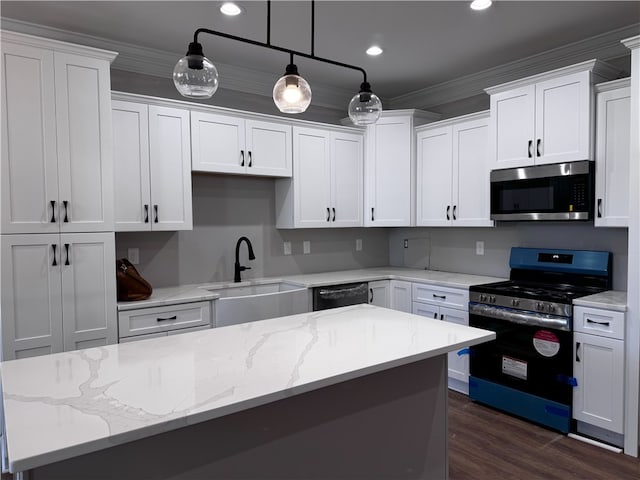 629 Mountain View Rd, Williamston, SC 29697 - kitchen featuring appliances with stainless steel finishes, a sink, white cabinetry, dark wood-style flooring, and crown molding