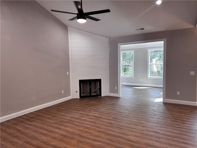 629 Mountain View Rd, Williamston, SC 29697 - unfurnished living room featuring lofted ceiling, dark wood finished floors, a ceiling fan, baseboards, and a large fireplace