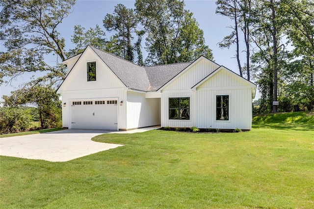 629 Mountain View Rd, Williamston, SC 29697 - modern farmhouse with a shingled roof, a front lawn, driveway, and an attached garage