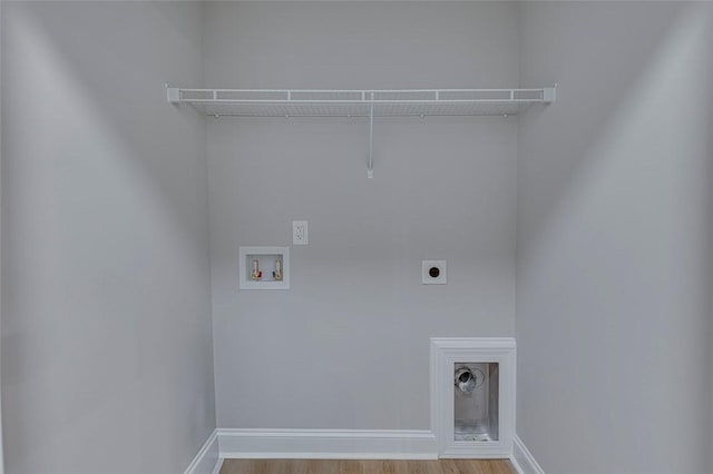 629 Mountain View Rd, Williamston, SC 29697 - laundry room with electric dryer hookup, hookup for a washing machine, and wood finished floors