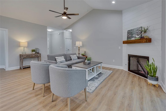 629 Mountain View Rd, Williamston, SC 29697 - living area featuring ceiling fan, light wood-style flooring, a large fireplace, and high vaulted ceiling