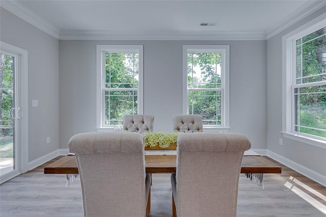 629 Mountain View Rd, Williamston, SC 29697 - dining area with plenty of natural light, crown molding, and light wood-style floors
