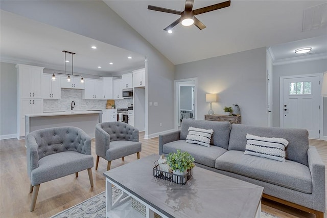 629 Mountain View Rd, Williamston, SC 29697 - living room featuring a ceiling fan, light wood-type flooring, crown molding, lofted ceiling, and recessed lighting