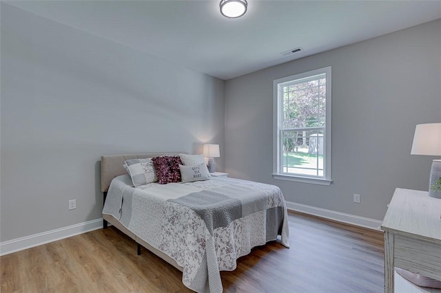 629 Mountain View Rd, Williamston, SC 29697 - bedroom with wood finished floors and multiple windows