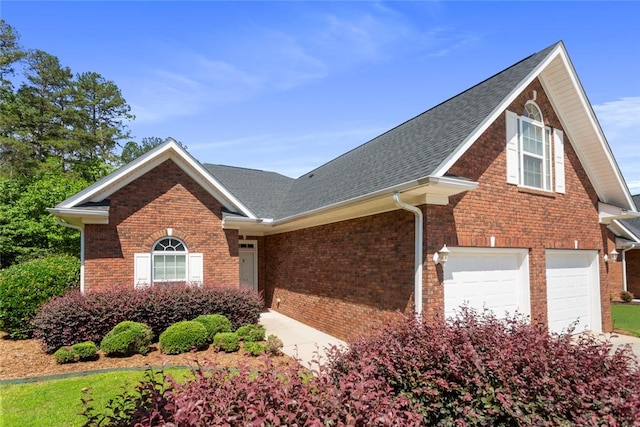 704 Nottingham Ct, Seneca, SC 29672 - view of front of property featuring brick siding, roof with shingles, and an attached garage
