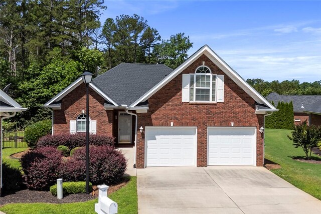 704 Nottingham Ct, Seneca, SC 29672 - traditional home featuring concrete driveway, brick siding, and a garage