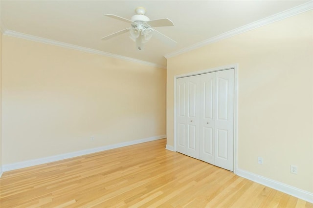 207 W Green Chase, Anderson, SC 29621 - unfurnished bedroom with crown molding, light wood-style floors, baseboards, a closet, and a ceiling fan
