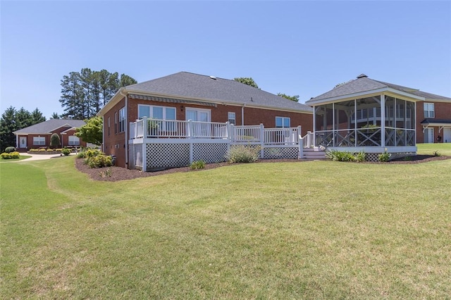 207 W Green Chase, Anderson, SC 29621 - rear view of house with a sunroom, a wooden deck, a lawn, and brick siding