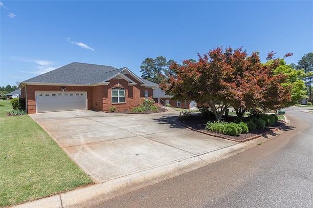 207 W Green Chase, Anderson, SC 29621 - ranch-style house with an attached garage, brick siding, driveway, and a front yard