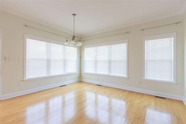 207 W Green Chase, Anderson, SC 29621 - unfurnished room featuring a chandelier, light wood-type flooring, crown molding, and baseboards