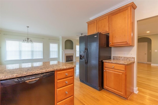 207 W Green Chase, Anderson, SC 29621 - kitchen with dishwashing machine, black fridge, light wood-style floors, light stone countertops, and ornamental molding