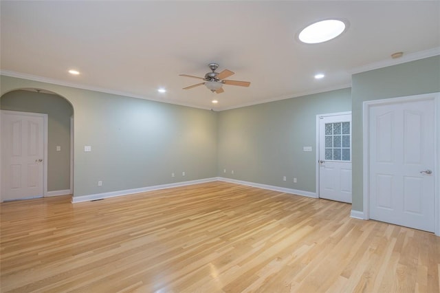 207 W Green Chase, Anderson, SC 29621 - unfurnished room with arched walkways, a ceiling fan, ornamental molding, light wood-style flooring, and baseboards
