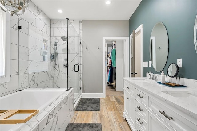 100 Grandview Dr, Anderson, SC 29625 - full bath with a stall shower, a bath, wood finished floors, recessed lighting, and double vanity