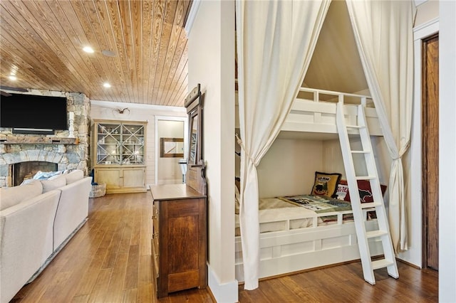 194 Cool Water Way, Sunset, SC 29685 - bedroom with wood ceiling, hardwood / wood-style flooring, and a fireplace