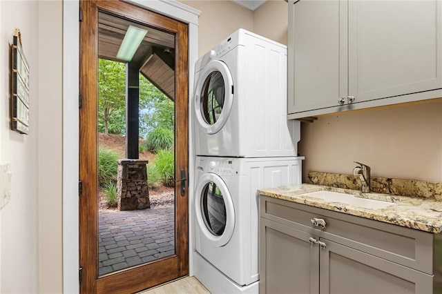194 Cool Water Way, Sunset, SC 29685 - washroom with stacked washing machine and dryer and cabinet space