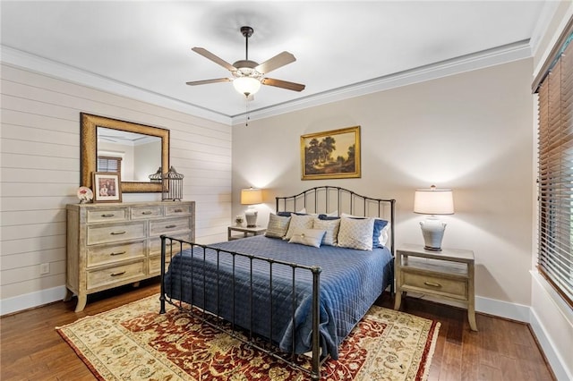 194 Cool Water Way, Sunset, SC 29685 - bedroom featuring crown molding, baseboards, wood finished floors, wood walls, and a ceiling fan