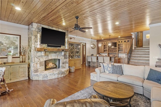 194 Cool Water Way, Sunset, SC 29685 - living area with a stone fireplace, stairway, wood-type flooring, a ceiling fan, and wood ceiling