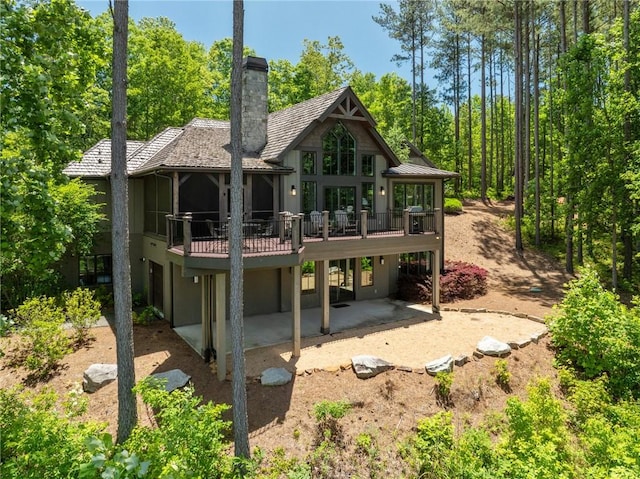 251 Settlement Blvd, Sunset, SC 29685 - back of house featuring a patio, a chimney, stucco siding, a deck, and a standing seam roof