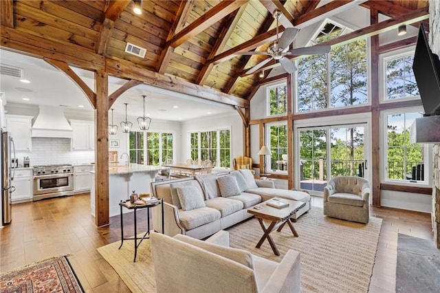 251 Settlement Blvd, Sunset, SC 29685 - living area with wooden ceiling with exposed beams, hardwood / wood-style flooring, high vaulted ceiling, and a ceiling fan