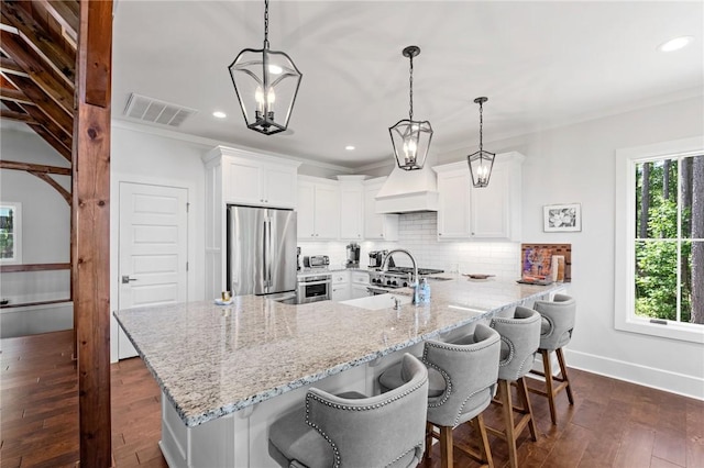 251 Settlement Blvd, Sunset, SC 29685 - kitchen featuring stainless steel refrigerator, dark wood finished floors, light stone countertops, decorative backsplash, and recessed lighting