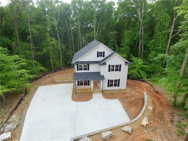 116 Fern Cir, Clemson, SC 29631 - view of front of property with a forest view, covered porch, and roof with shingles