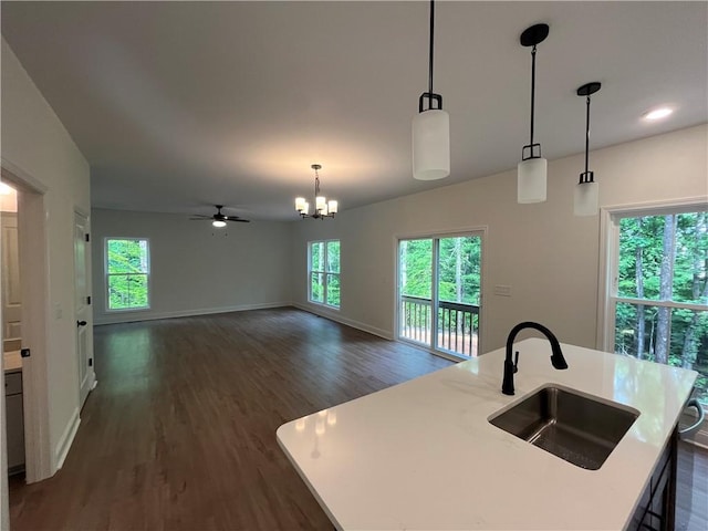 116 Fern Cir, Clemson, SC 29631 - kitchen featuring a sink, dark wood-style floors, baseboards, a chandelier, and light countertops