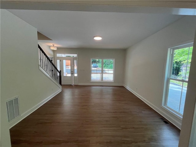 116 Fern Cir, Clemson, SC 29631 - unfurnished living room with baseboards, dark wood-style floors, stairs, and recessed lighting