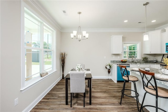 106 N St, Belton, SC 29627 - dining room featuring a chandelier, dark wood finished floors, crown molding, baseboards, and recessed lighting