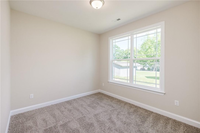 106 N St, Belton, SC 29627 - carpeted spare room with baseboards
