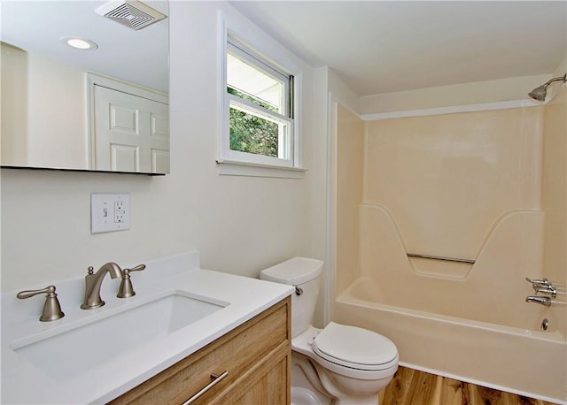 208 Aiken St, Central, SC 29630 - bathroom with vanity, bathing tub / shower combination, toilet, and wood finished floors
