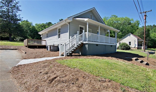 208 Aiken St, Central, SC 29630 - view of front of house featuring stairs, covered porch, and a front lawn