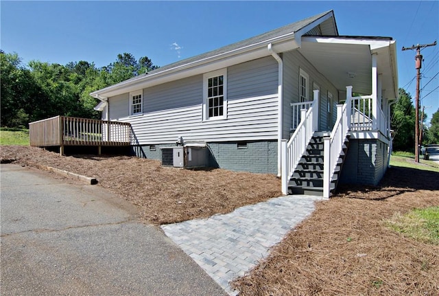208 Aiken St, Central, SC 29630 - view of home's exterior featuring crawl space, stairway, and a deck