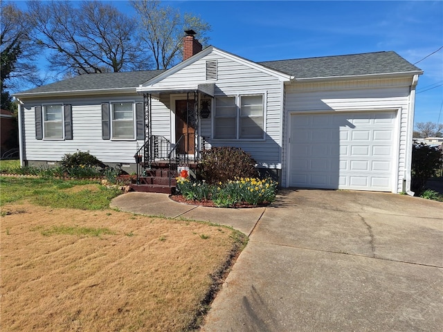 709 Ferry St, Anderson, SC 29626 - single story home featuring driveway, a chimney, an attached garage, roof with shingles, and a front lawn