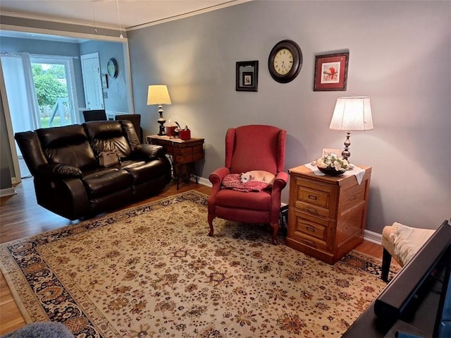709 Ferry St, Anderson, SC 29626 - living area with wood finished floors, crown molding, and baseboards