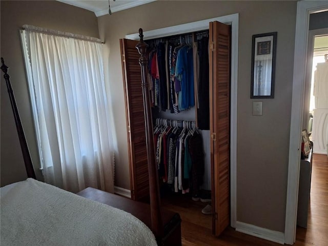 709 Ferry St, Anderson, SC 29626 - bedroom featuring ornamental molding, wood finished floors, baseboards, and a closet