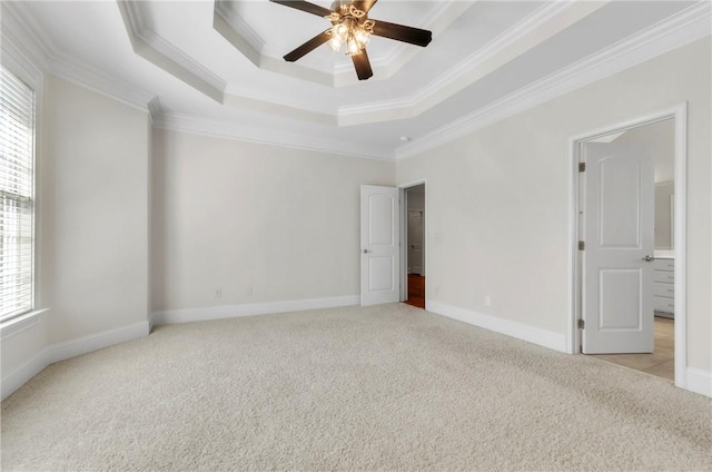 206 Waverly Hall Ln, Simpsonville, SC 29681 - unfurnished bedroom with multiple windows, a raised ceiling, light colored carpet, crown molding, and baseboards