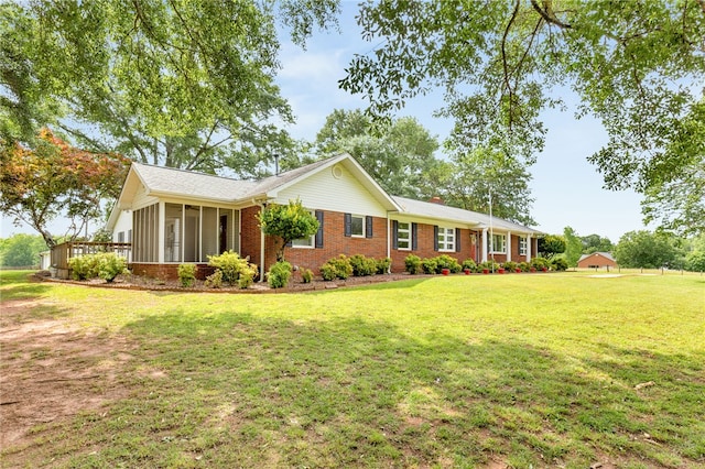 1142 Fox Squirrel Ridge Rd, Pickens, SC 29671 - ranch-style home featuring brick siding, a sunroom, and a front lawn